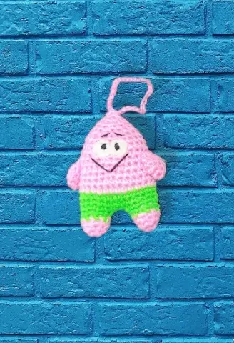 عروسک دست‌بافت موجو موجو